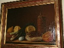 'Natura morta con limoni, arancia, radicchio e bottiglia', olio su tela attribuita a Nicola Levoli (Rimini 1728/30-1801). - Foto 01